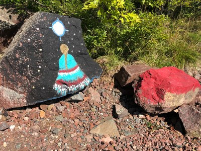Native Canadian artwork on the rocks at Lake Superior Shoreline at Gros Cap.
